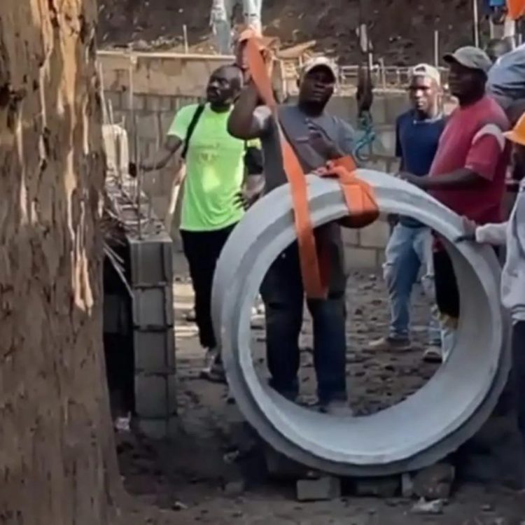 Haitianos colocan alcantarillas para conectar canal con río Masacre